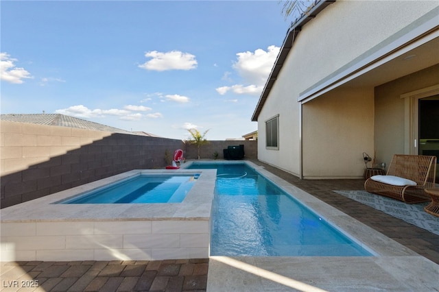 view of pool featuring an in ground hot tub