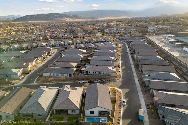 bird's eye view with a mountain view