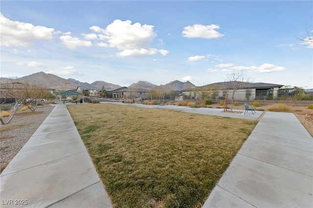 view of yard with a gazebo and a mountain view