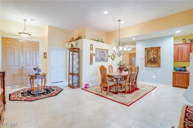 dining space featuring a chandelier, visible vents, and recessed lighting