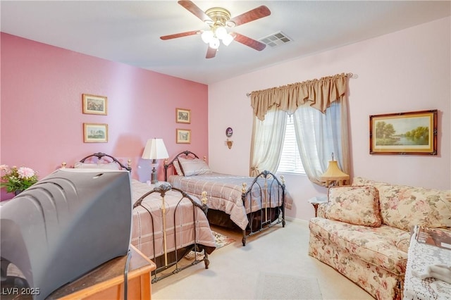 bedroom featuring carpet, visible vents, and a ceiling fan