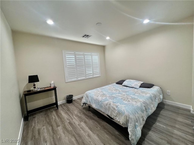 bedroom featuring light hardwood / wood-style floors