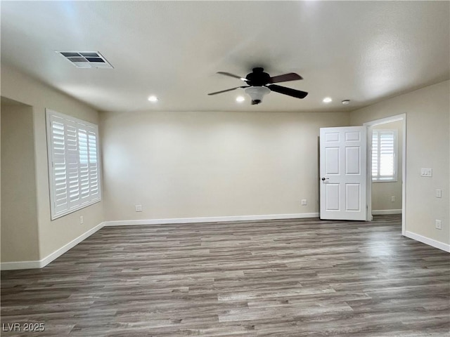 10618 Timber Stand St, Las Vegas, NV 89183 - unfurnished room featuring recessed lighting, baseboards, ceiling fan, visible vents, and wood finished floors