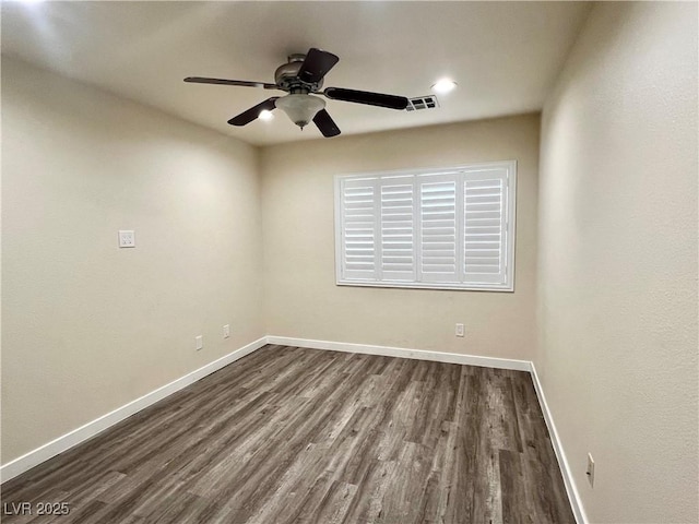 10618 Timber Stand St, Las Vegas, NV 89183 - spare room with recessed lighting, baseboards, ceiling fan, visible vents, and dark wood-style floors