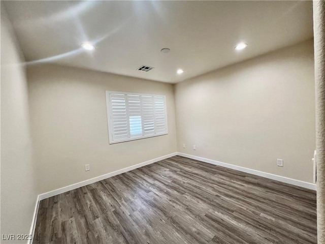 10618 Timber Stand St, Las Vegas, NV 89183 - empty room featuring baseboards, dark wood-style flooring, visible vents, and recessed lighting