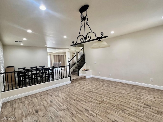 10618 Timber Stand St, Las Vegas, NV 89183 - interior space featuring stairs, wood finished floors, baseboards, and recessed lighting