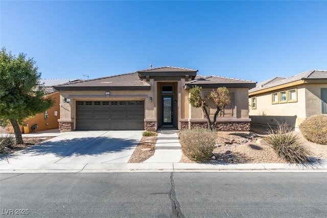 prairie-style house featuring a garage