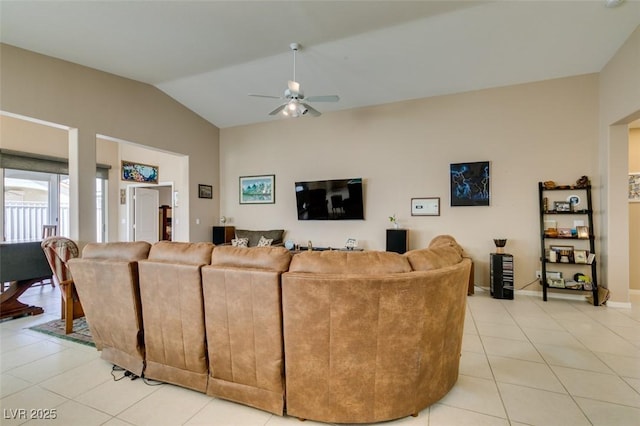 living room with vaulted ceiling, ceiling fan, and light tile patterned flooring