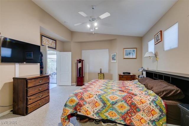 bedroom featuring vaulted ceiling and ceiling fan