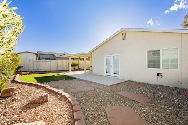 rear view of property with a patio