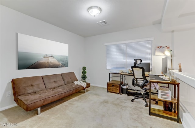 office area featuring light colored carpet