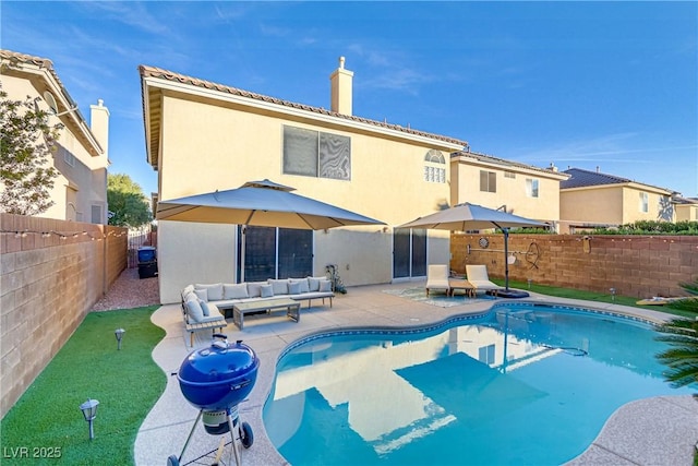 view of pool featuring outdoor lounge area and a patio area