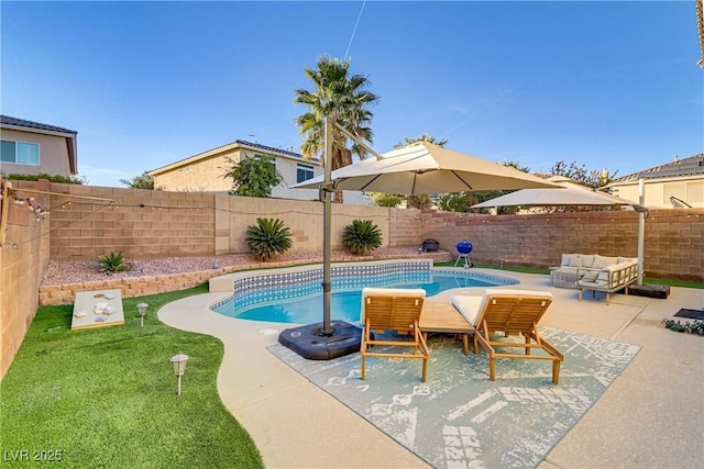 view of swimming pool featuring an outdoor living space and a patio