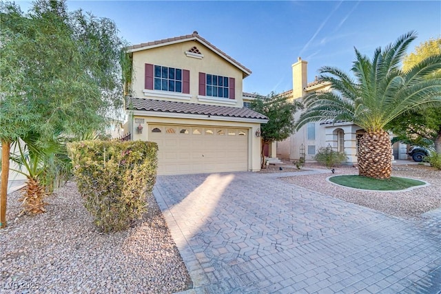 view of front of house with a garage