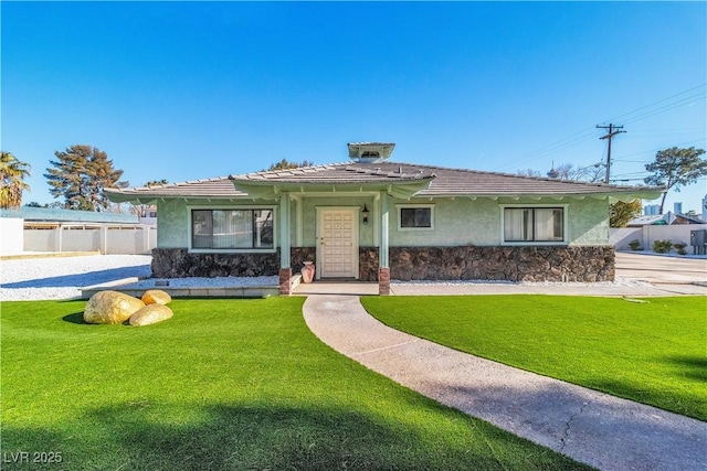 view of front of home with a front lawn