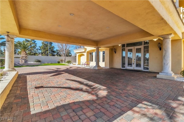 view of patio featuring french doors