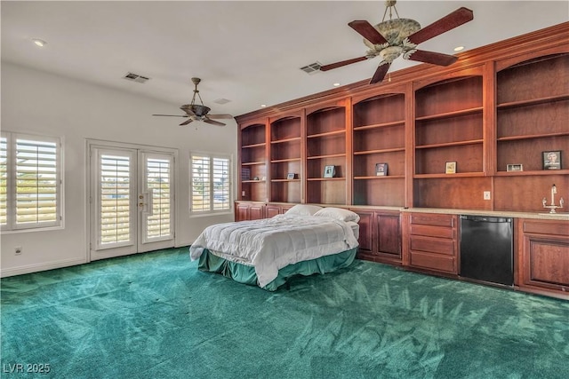 carpeted bedroom featuring ceiling fan, refrigerator, bar, access to outside, and french doors