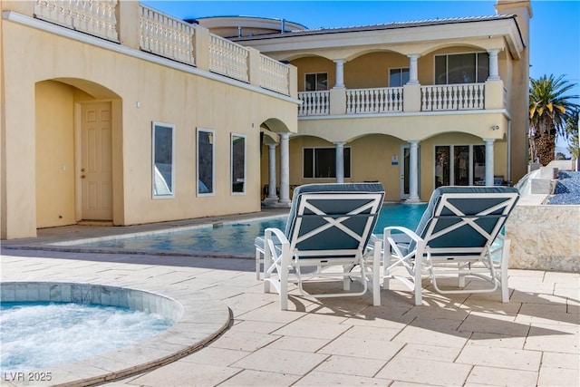 view of pool with a patio