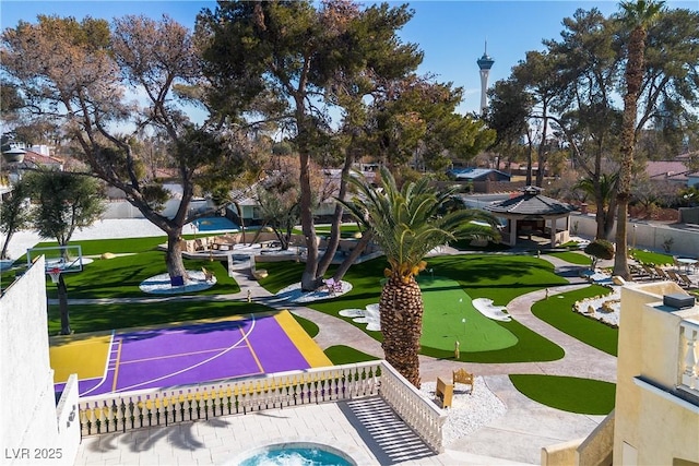 view of property's community with a gazebo and basketball court