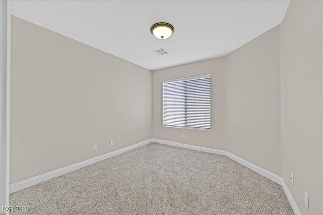 unfurnished room featuring carpet flooring