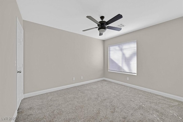 empty room with carpet floors and ceiling fan