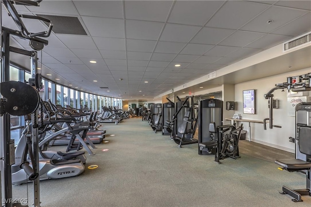 exercise room with a drop ceiling