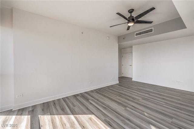 200 W Sahara Ave Unit 2108, Las Vegas, NV 89102 - unfurnished room with wood finished floors, a ceiling fan, and baseboards