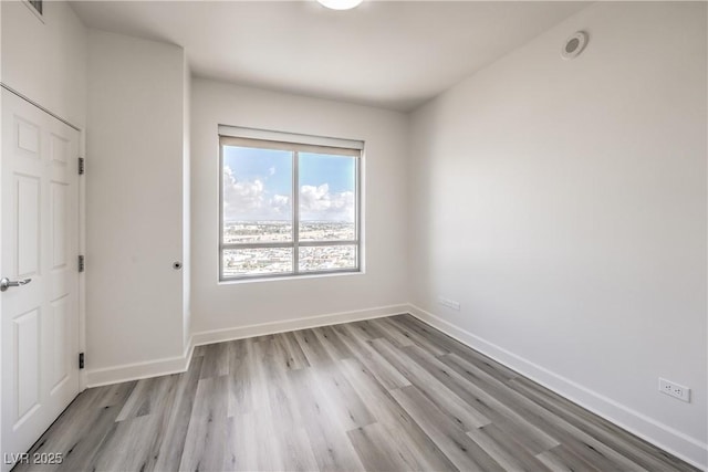 200 W Sahara Ave Unit 2108, Las Vegas, NV 89102 - empty room featuring light wood finished floors and baseboards