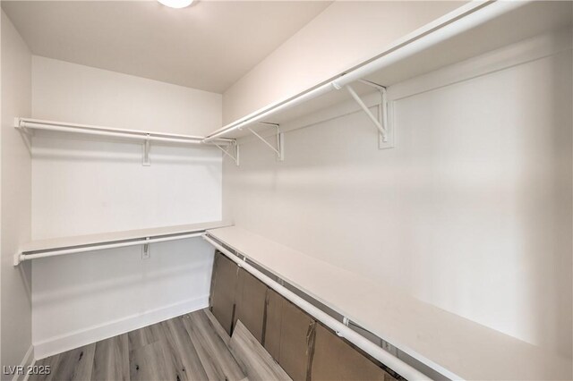 200 W Sahara Ave Unit 2108, Las Vegas, NV 89102 - walk in closet featuring light wood-type flooring