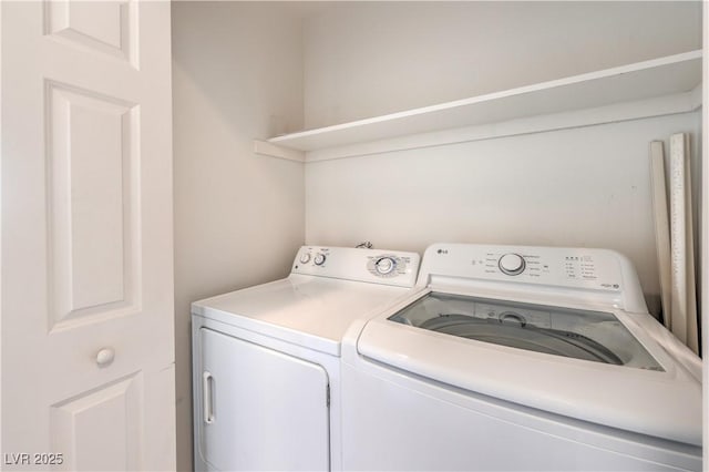 200 W Sahara Ave Unit 2108, Las Vegas, NV 89102 - laundry area featuring separate washer and dryer