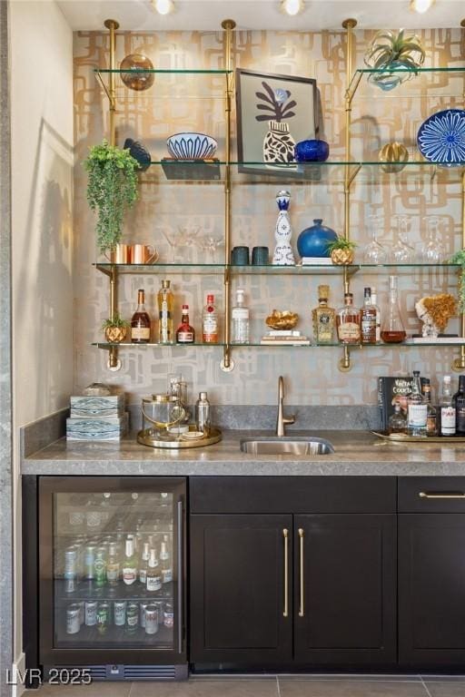 bar featuring sink and wine cooler