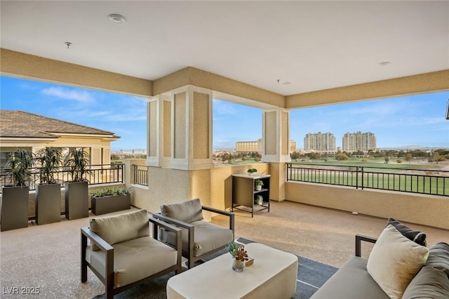 view of patio / terrace with a balcony and an outdoor living space