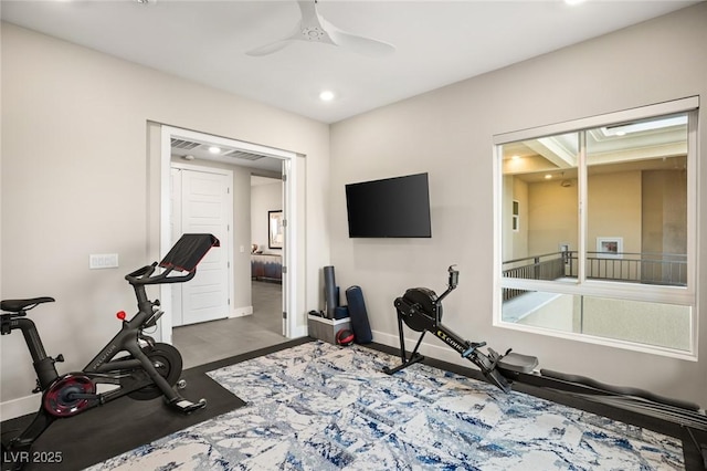 workout room featuring ceiling fan