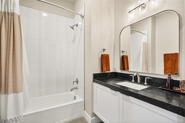 bathroom with vanity and shower / tub combo