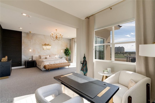 bedroom with a notable chandelier and carpet flooring