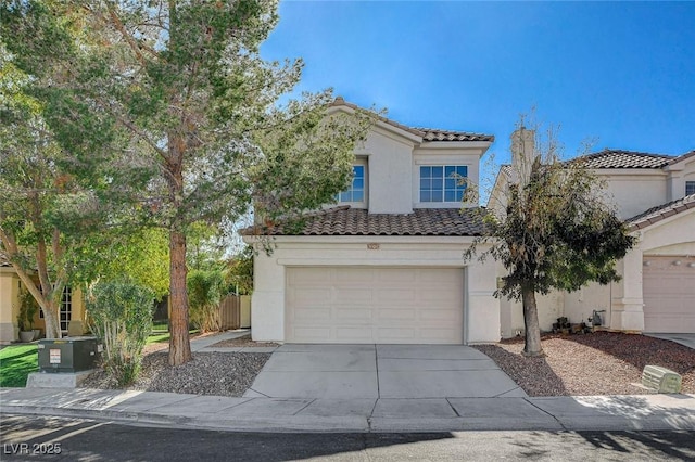 mediterranean / spanish house with a garage and central AC unit