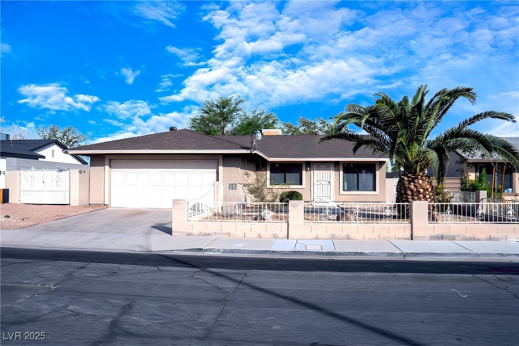 single story home featuring a garage