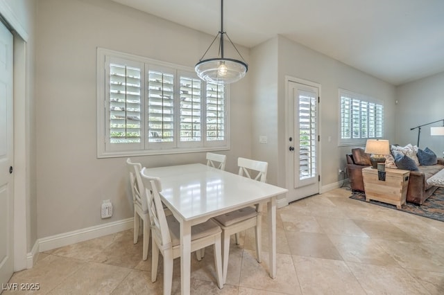 dining room with light tile patterned floors