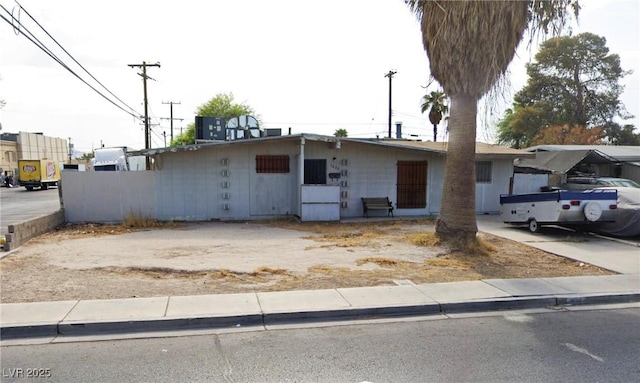 view of front of property featuring central AC unit