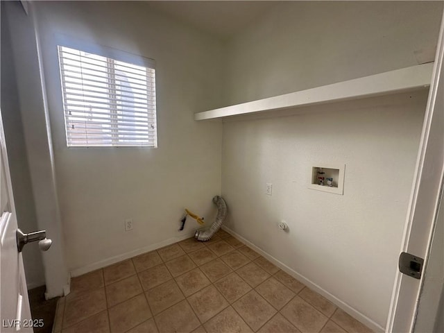 laundry area with washer hookup, hookup for a gas dryer, and light tile patterned floors