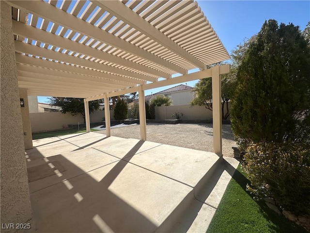 view of patio featuring a pergola