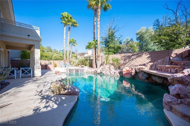 view of pool featuring a patio