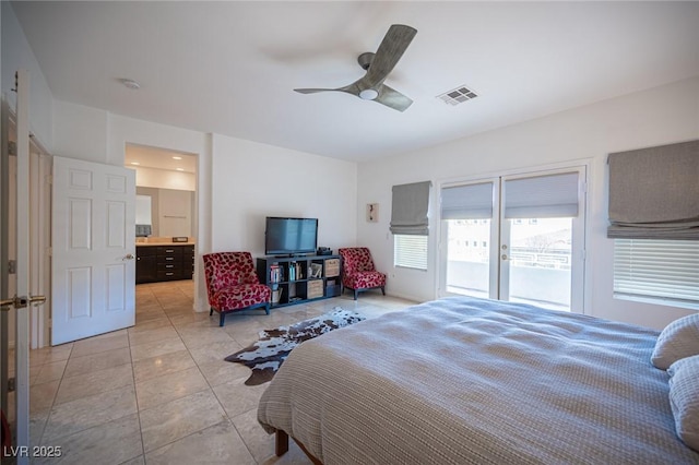 tiled bedroom with access to outside and ceiling fan