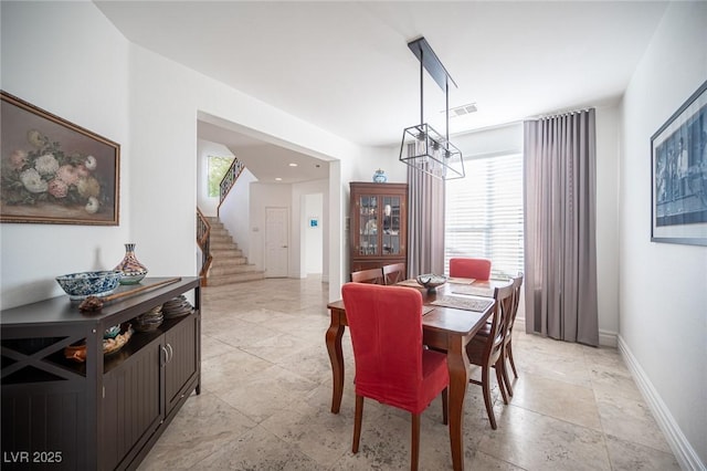 dining area with a chandelier