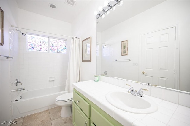 full bathroom with tile patterned floors, vanity, toilet, and shower / tub combo