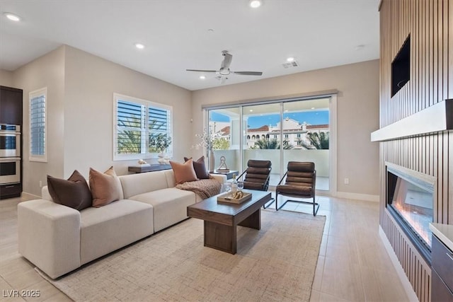 living room featuring ceiling fan