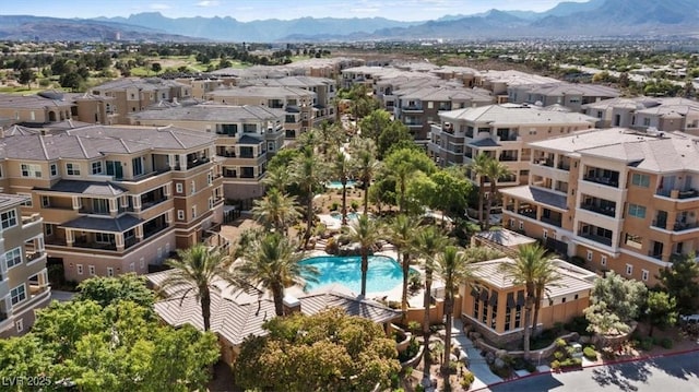 birds eye view of property featuring a mountain view