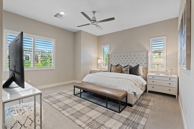 carpeted bedroom with ceiling fan