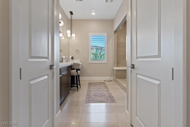 bathroom with tile patterned flooring