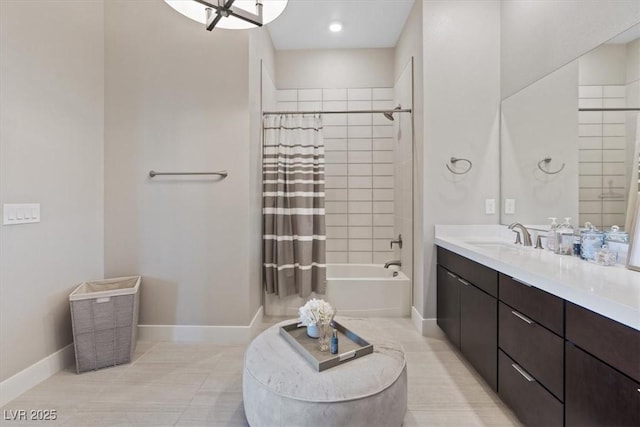 bathroom with tile patterned flooring, vanity, and shower / tub combo